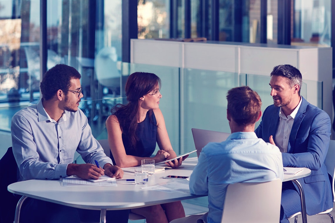 half page image small open office meeting