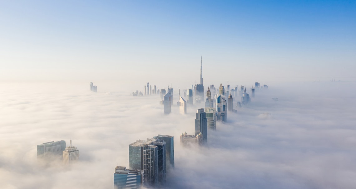 areal view of city skyline in fog to represent the uncertainty of selling in h2 of 2023.