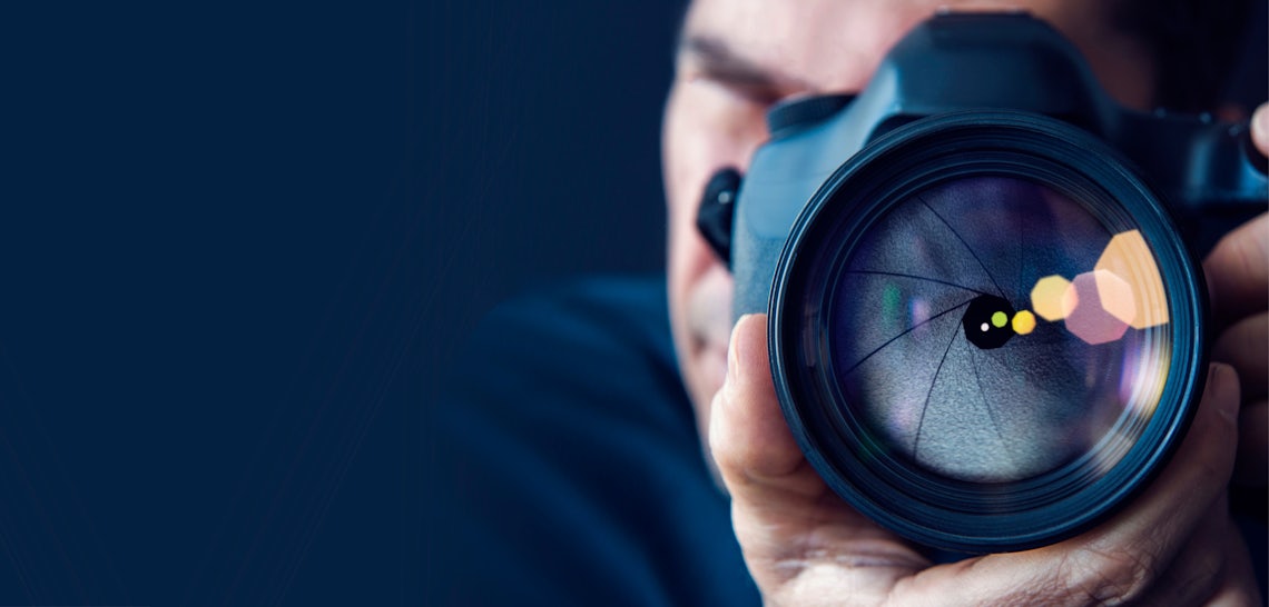 Up close camera lense signifying focusing on existing sales customers