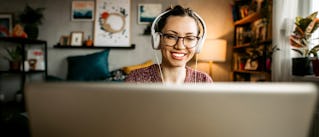 woman at computer taking an online sales training course